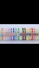 Load image into Gallery viewer, 12 pieces multicolor evil eye bracelet / Pulceras multicolor con ojo turco